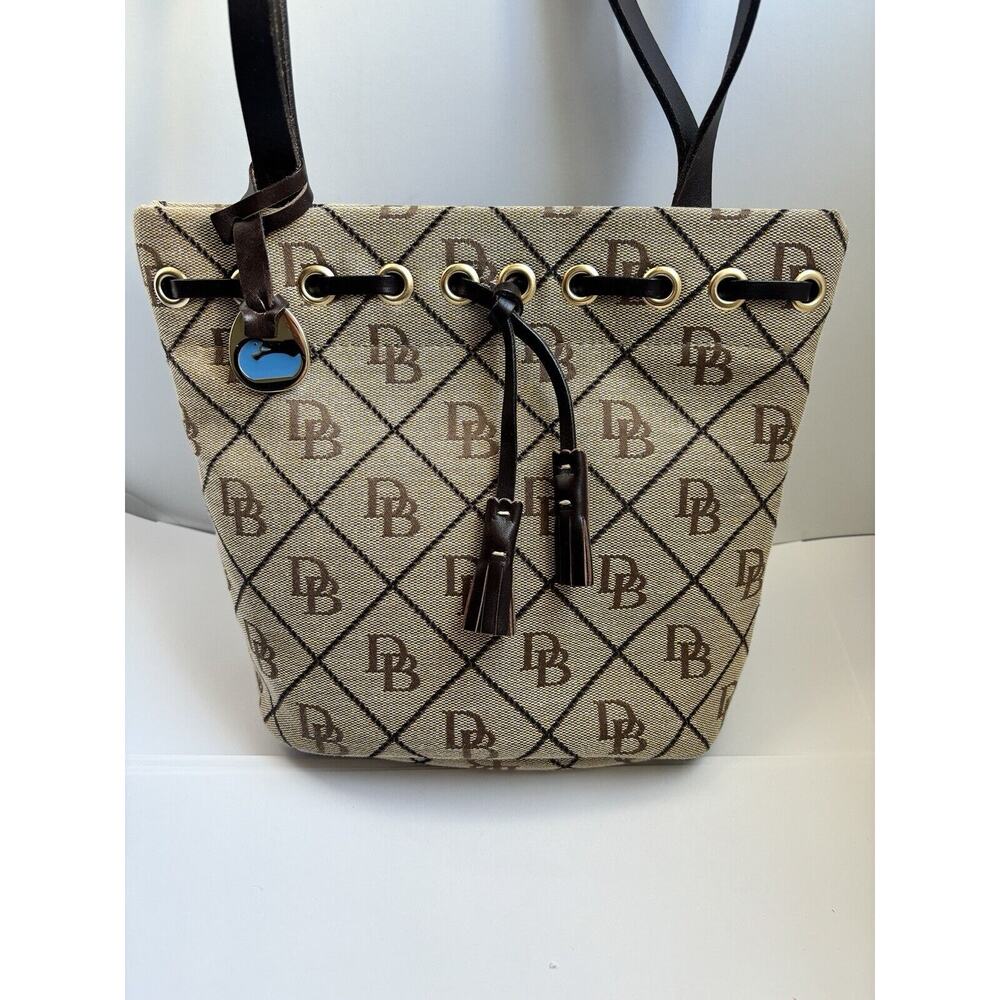 NWOT DOONEY & BOURKE Signature Monogram Bucket Purse Handbag Beige Brown Tassels